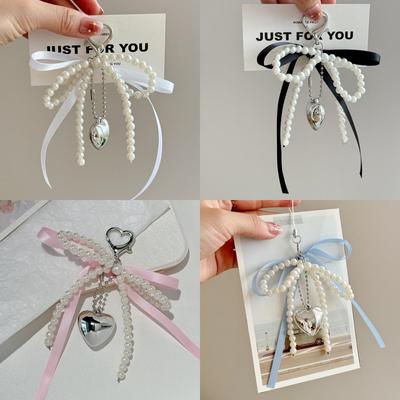 Elegant French Pearl Bowknot Bag Charm with Heart Pendant Keychain