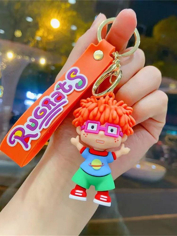 Cartoon Naughty Boy Keychain New Cute Silicone Doll Bag Hanging Car Key Chain 6 cm красный