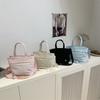 Fresh and sweet girl simple casual going out large capacity solid color spring hand carry shoulder small messenger bag