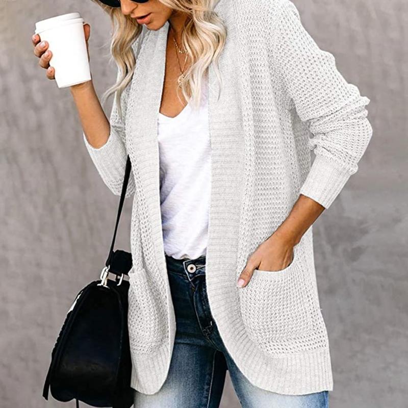 white sweater with pockets