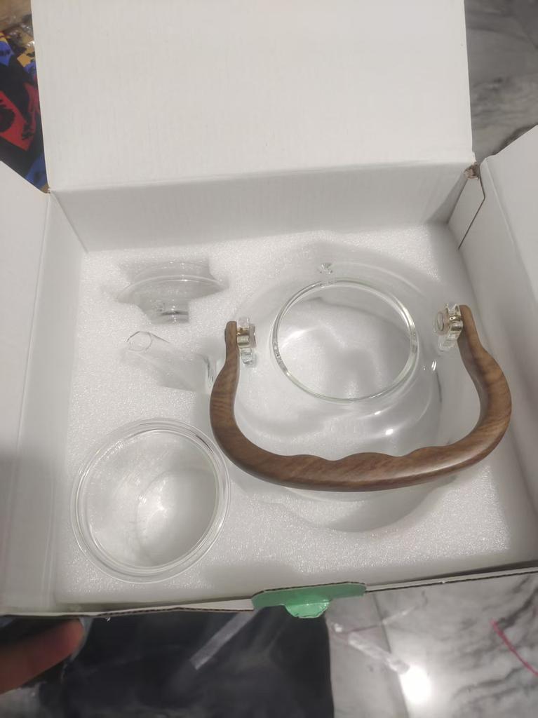 New glass teapot for brewing tea, suitable for home use on a high-temperature resistant electric ceramic stove, with handle and