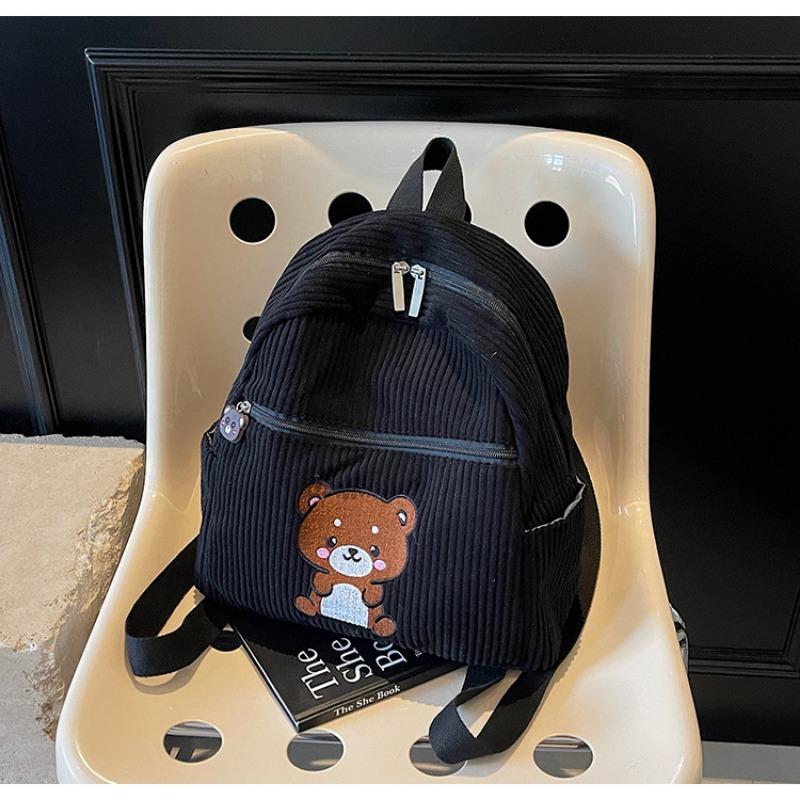 

Универсальный повседневный рюкзак Женский универсальный литературный рюкзак Маленький свежий однотонный рюкзак с медведем чёрный