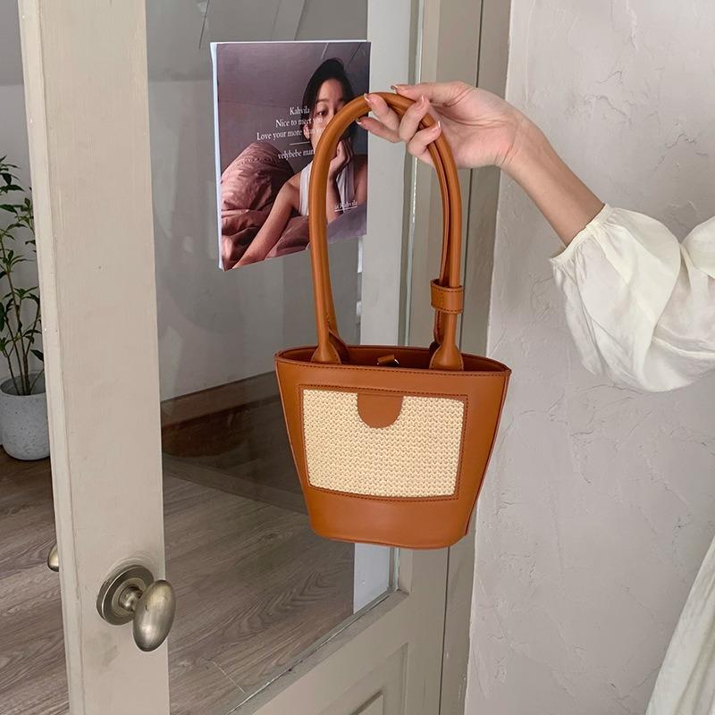 Niche Design Straw Woven Portable Small Bag New Bucket Bag Retro Hand Carry Shoulder Armpit Bag