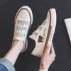 Elastiskt band björn låga canvas skor dam vår nya en-pedal lata skor casual student gummiskor brädskor