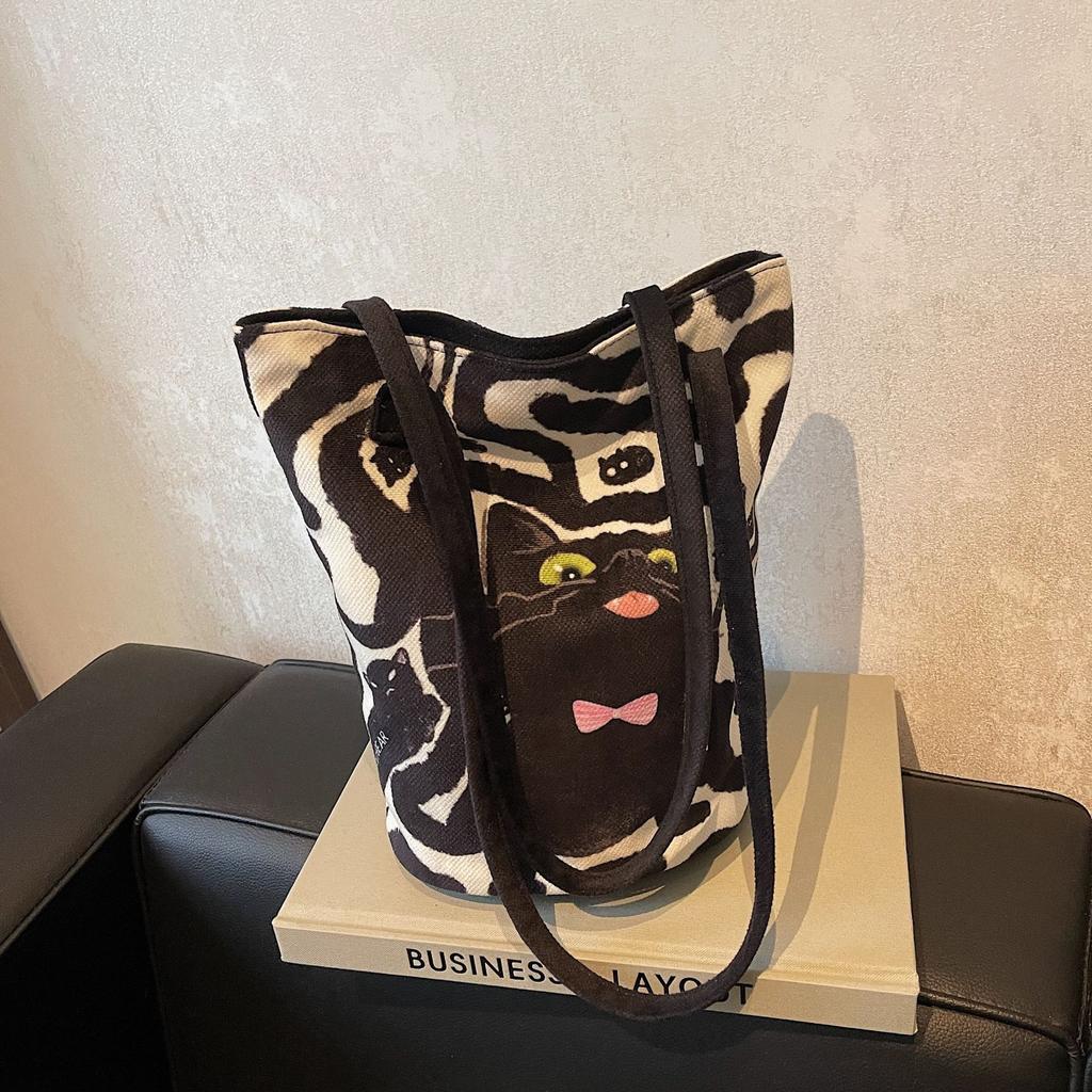 Autumn and winter cute cartoon kitten canvas bag 2025 casual shoulder bag fashion portable large capacity handbag bag