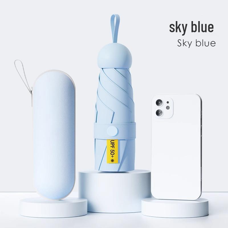 "Portable Capsule Umbrella: Compact, High-End Sunshade & Rain Protection"