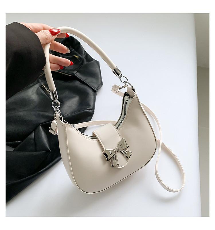 Sac selle en cuir PU avec surpiqûres et fermeture éclair pour un usage quotidien
