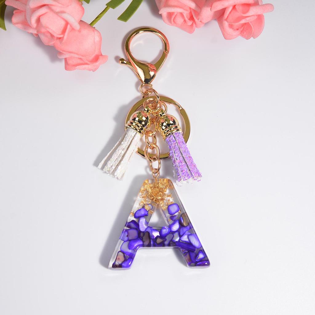Lila Kristall Epoxid Buchstaben Schlüsselanhänger mit Quaste - Harzschmuck Anhänger Charm