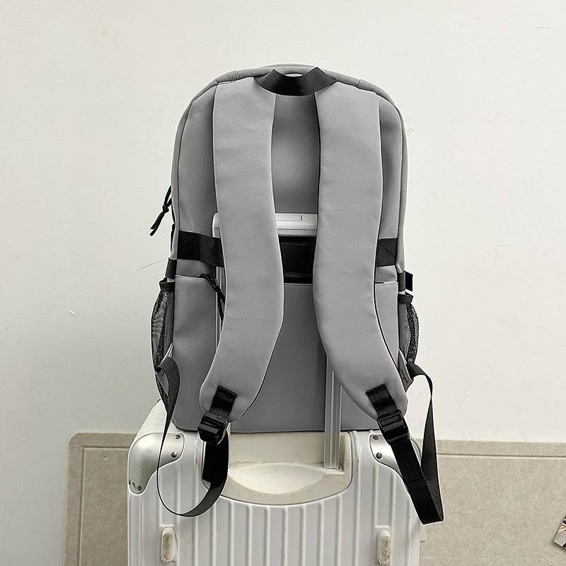 School bag 2025 new Korean version solid color couple backpack large capacity multi-compartment school bag casual simple versatile backpack