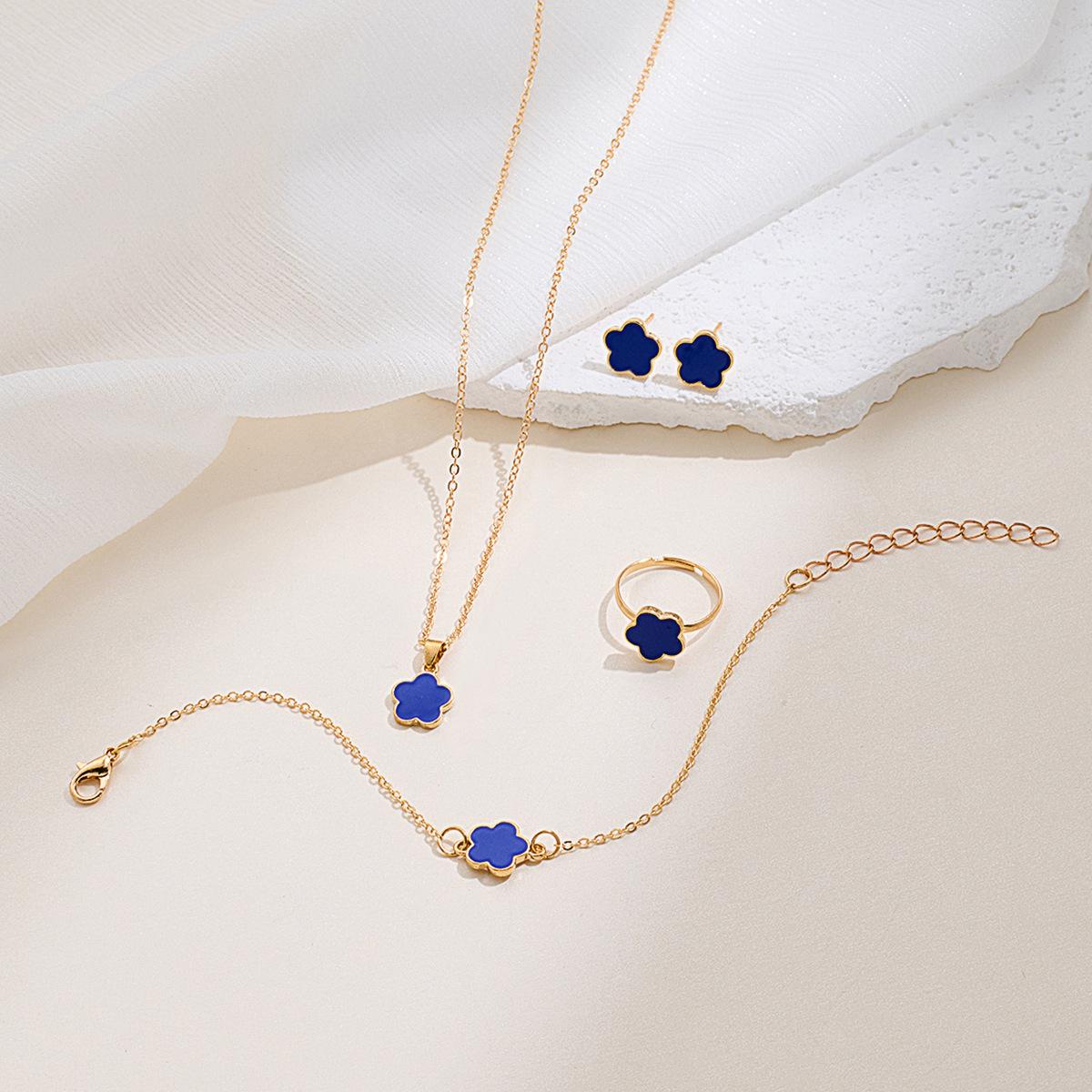 

Елегантний Набір Прикрас Чотирилисник: Високоякісний браслет, каблучка та кольє