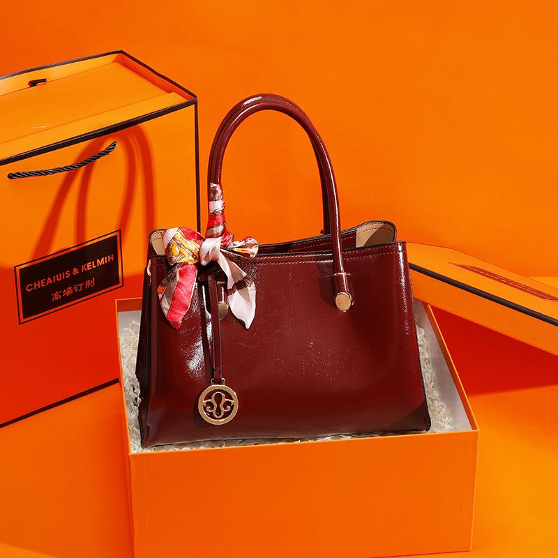 Elegant Red Mummy Bag: Fashionable, Spacious Handbag for Mother-of-the-Bride At Weddings