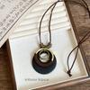 Bohemian wood beads beaded hollow round pendant necklace light luxury high-end sweater chain niche necklace accessories