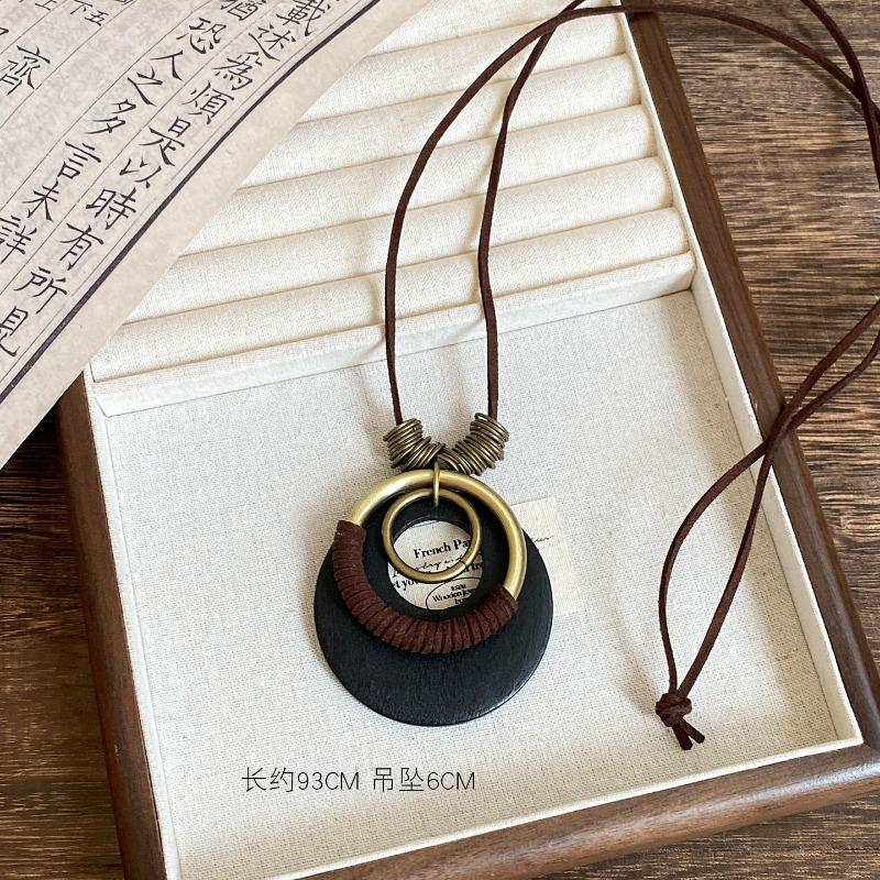 Bohemian wood beads beaded hollow round pendant necklace light luxury high-end sweater chain niche necklace accessories