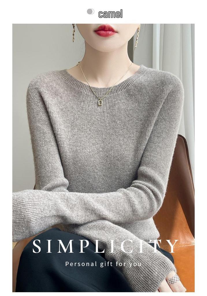 Round Neck Loose Fit Sweater with Seamless Knitting Technology - Comfortable and Slimming Design.