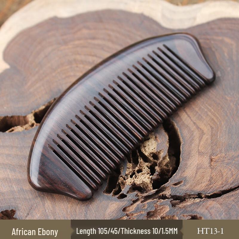 

Ebony & Merbau Wood Massage Comb