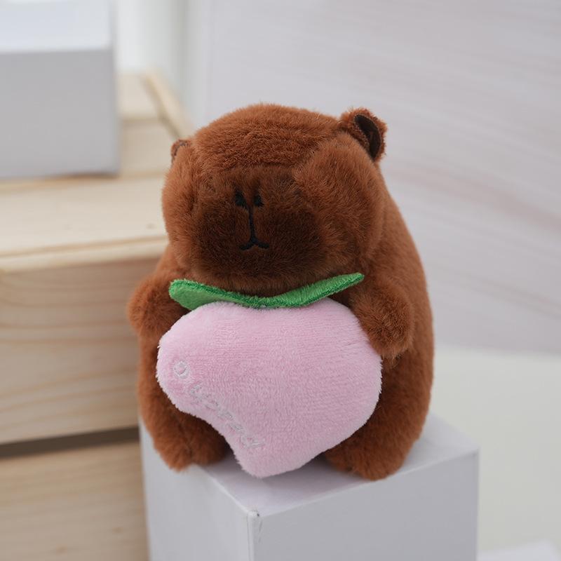 

Премиальный плюшевый брелок-капибара с мягким наполнителем из полипропиленового хлопка, идеально подходит для подарков детям Peach