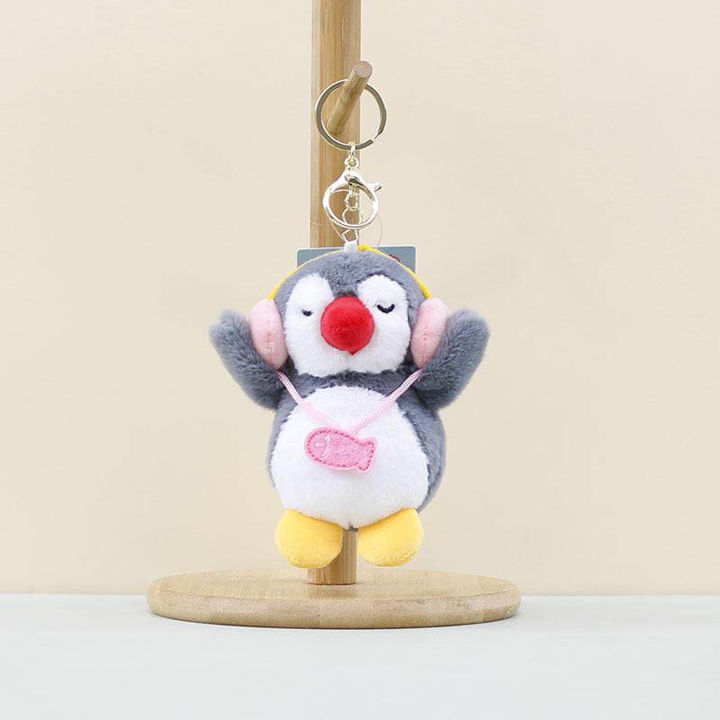 

Plush Enchanting Penguin Keychain With Headphone Design Perfect For Cute Accessory Lovers Pink Penguin Headphones