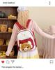 Cute Cartoon Trendy Backpack: Large Capacity, Lightweight, Versatile Travel/School Bag with Earphone and Doll Holder.