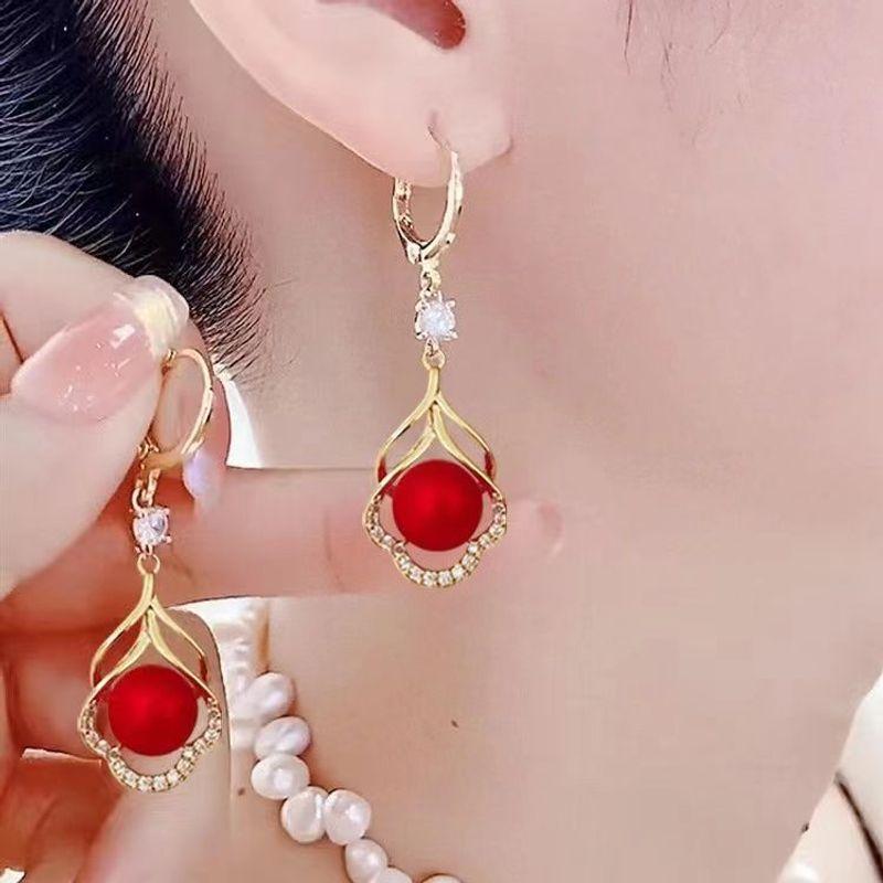 

2025 New Arrival Trendy Ornament New Year Red Festive Earrings Female Fall and Winter National Style New Year Elegant 999 Sterling Silver Hook Cloud Red Bead [Ear Buckle]]