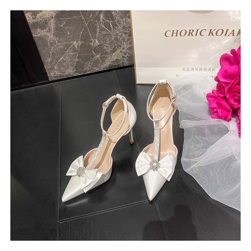 

Spring and Autumn new rhinestone bow pointed hollow high heels one word with bag head sandals satin white wedding shoes 33