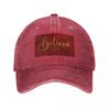 Believe Word Art In Gold Color Script Typography On Red Burgundy Background Baseball Cap Beach Anime Girl Unisexs
