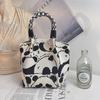 Versatile Large Knitted Handbag with Hollow-Out Flower Pattern