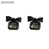 Glass Jewel Earrings With Black Bow