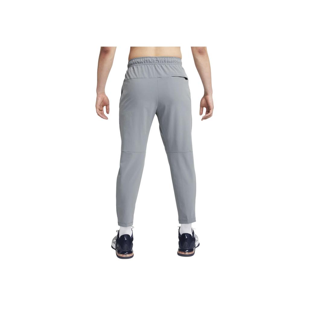 Nike Onbeperkte effen logo rechte casual broek Herenbroek Rookgrijs FB7547-084