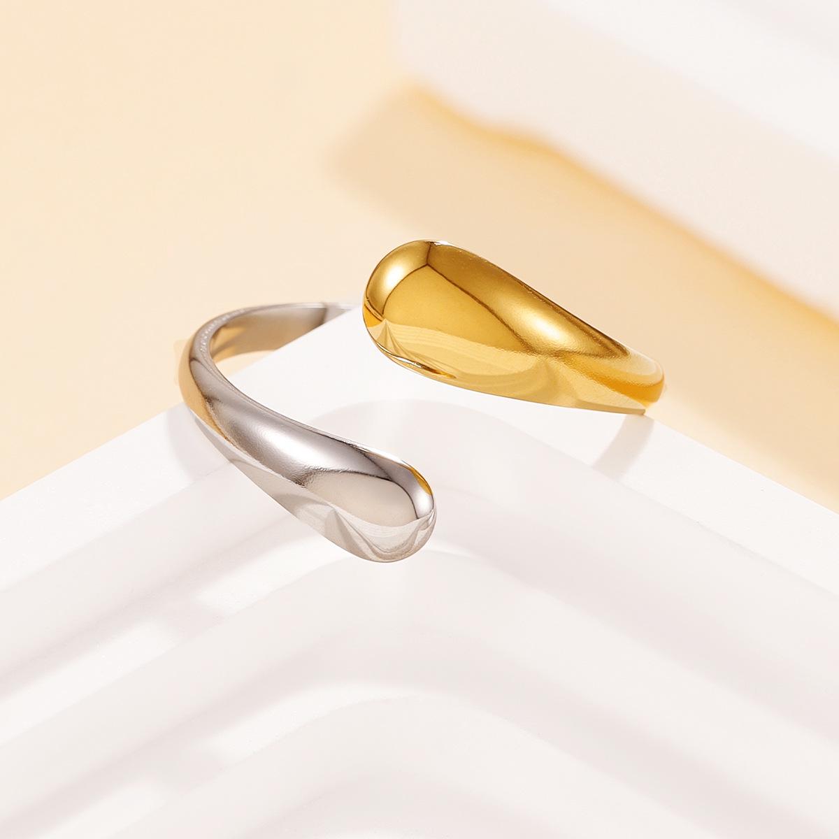 Stainless Steel Geometric Streamlined Ring with Inner Gold Plating