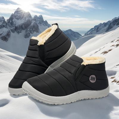 Gli stivali da neve da donna/uomo mantengono calde le scarpe invernali impermeabili