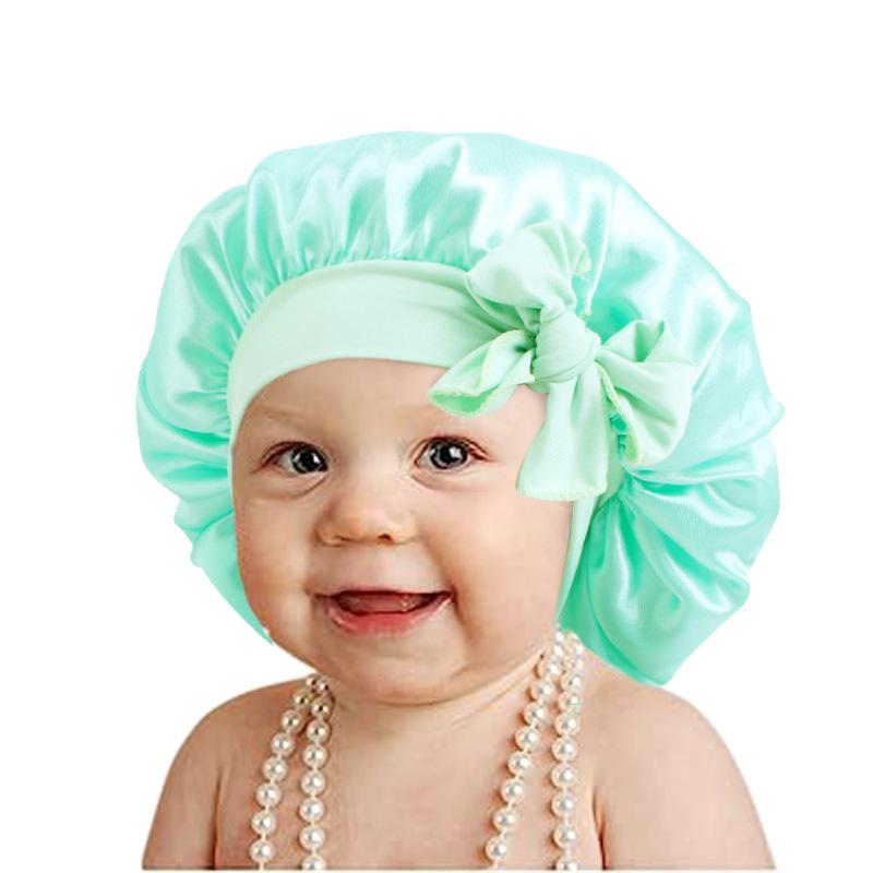 European and American popular wide-sided elastic streamer nightcap, children's bow solid color round hat home hat JDKB-21B