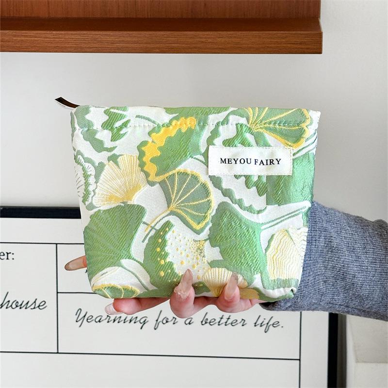 "Compact Fresh Cosmetic & Skincare Travel Bag - Portable Handheld Storage for Toiletries & Underwear"