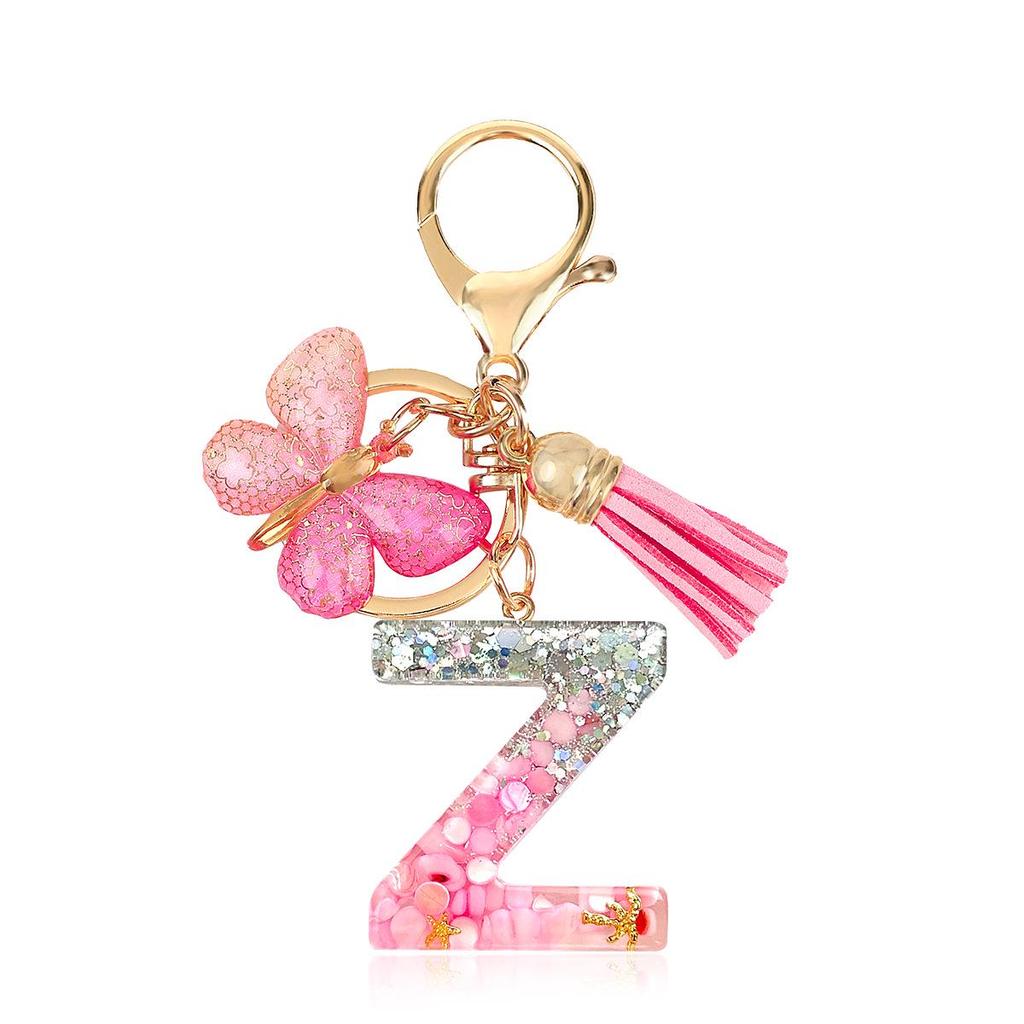 Pink Epoxy Letter Keychain with Sequin Butterfly & Tassel Charm