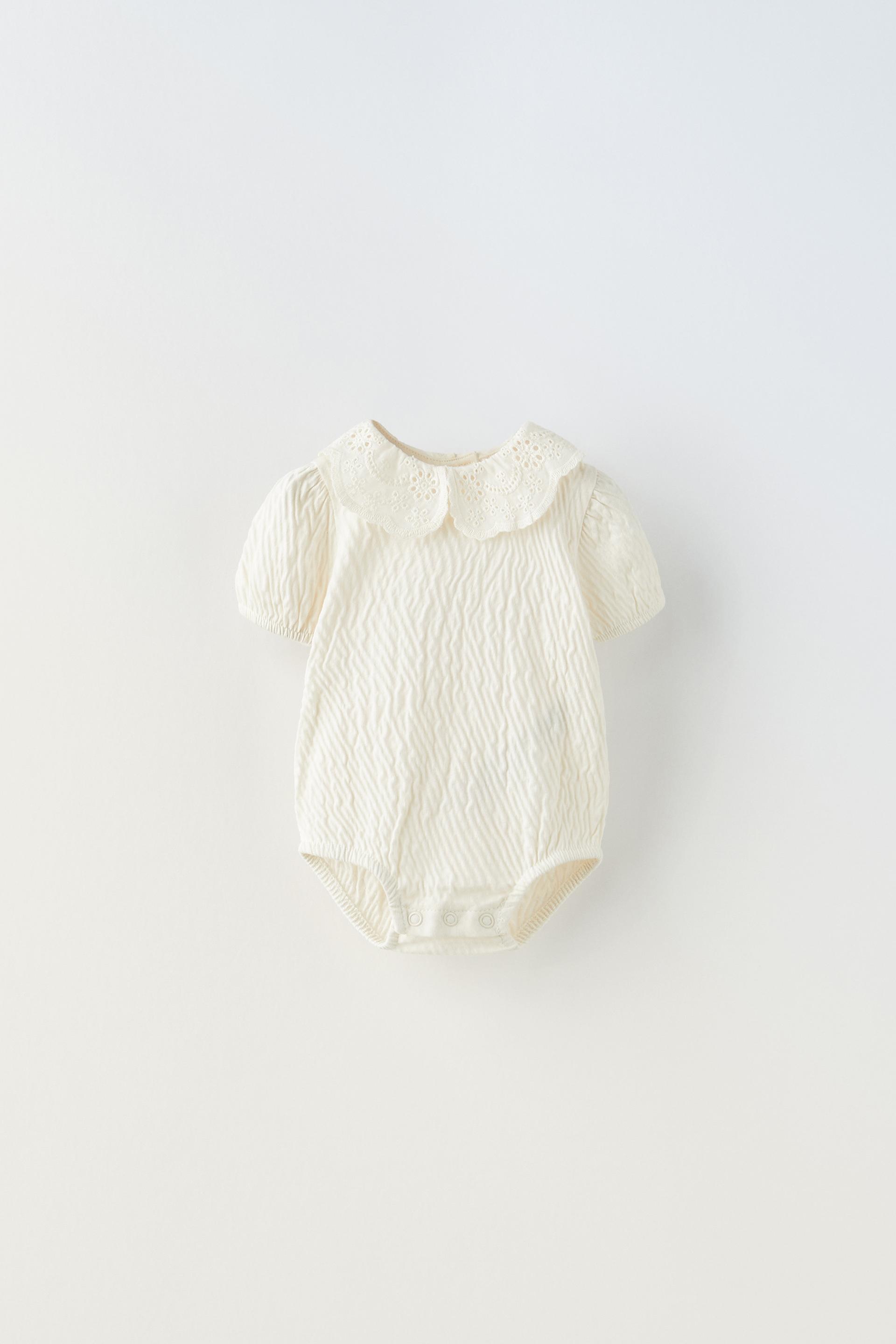 

ТЕКСТУРИРОВАННОЕ БОДИ С ВЫШИВКОЙ