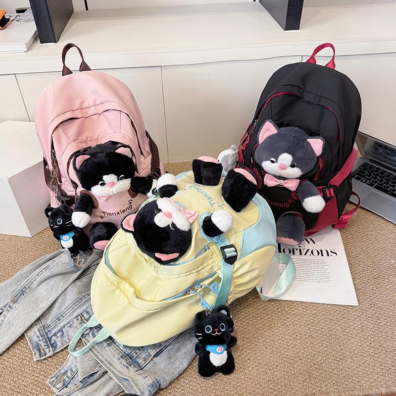 Schoolbag autumn new cute cat doll backpack female junior high school high school schoolbag large capacity campus style cute fun backpack