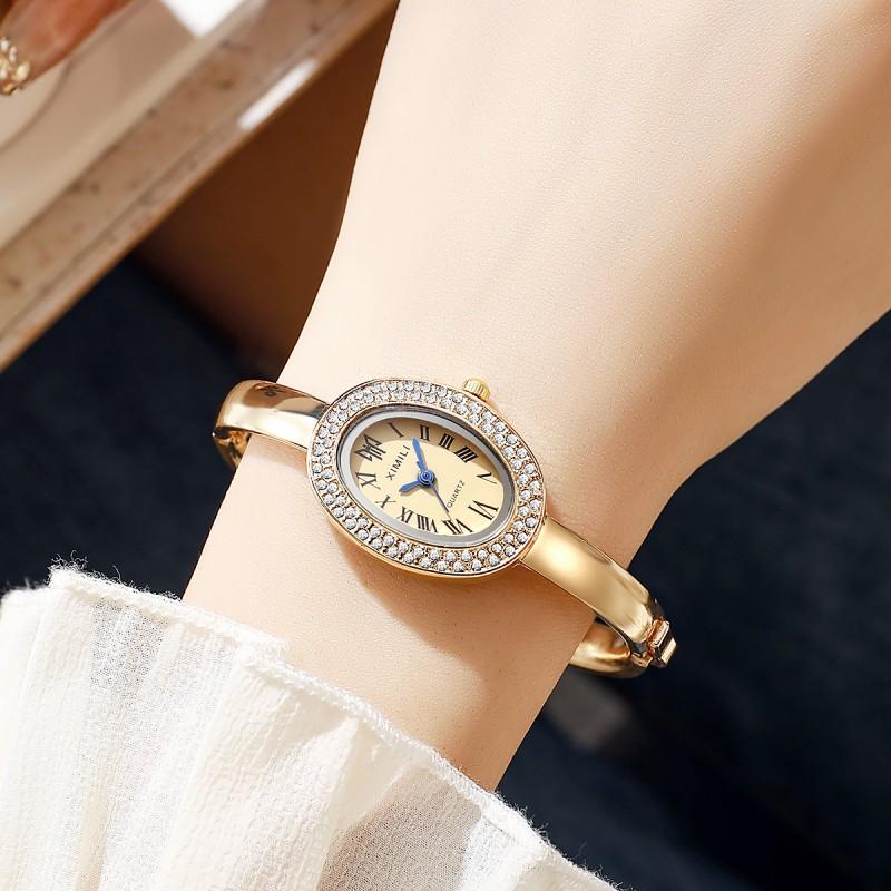 Womens Fashion Quartz Watch Oval Roman Numerals Bangle