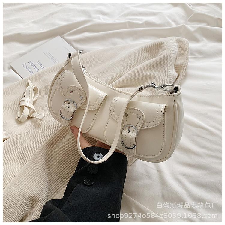 

Retro foreign shoulder women s bag 2025 new popular niche design hand carry fashion baguette bag Korean version armpit bag