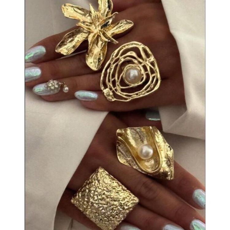 2025 New European & American Irregular Alloy Flower Ring Set - 4-Piece Exaggerated Niche Design for Women