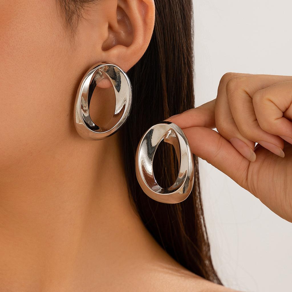 Personalized Metal Geometric Texture Hollow Stud Earrings Women Irregular Twist Glossy Earrings Earrings