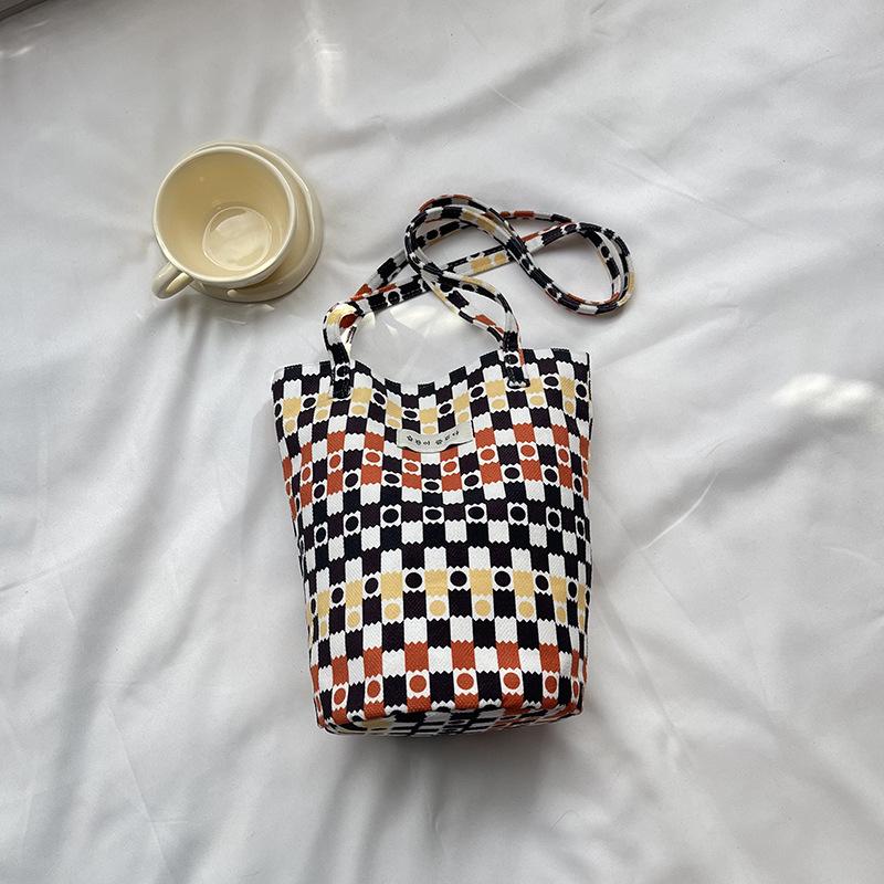 

Summer Fashi Shoulder Bag Waterproof Casual Minimalist Crossbody Bag Fashiable and Versatile Bucket Bag with Ethnic Print помаранчевий