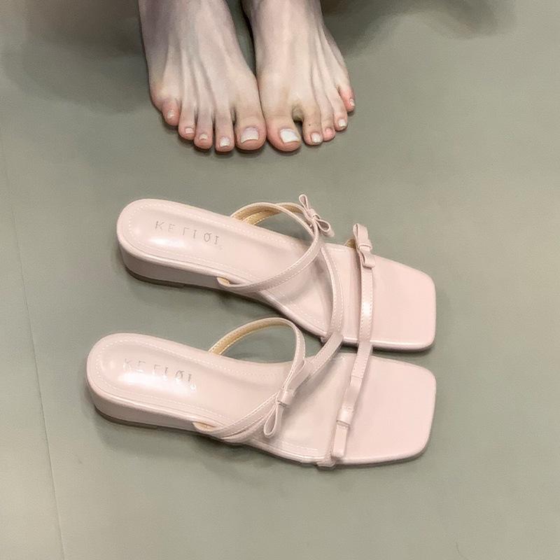 Bow square head low heel one-word drag girl wearing cool slippers in the summer of 2025 fairy style versatile pink sandals
