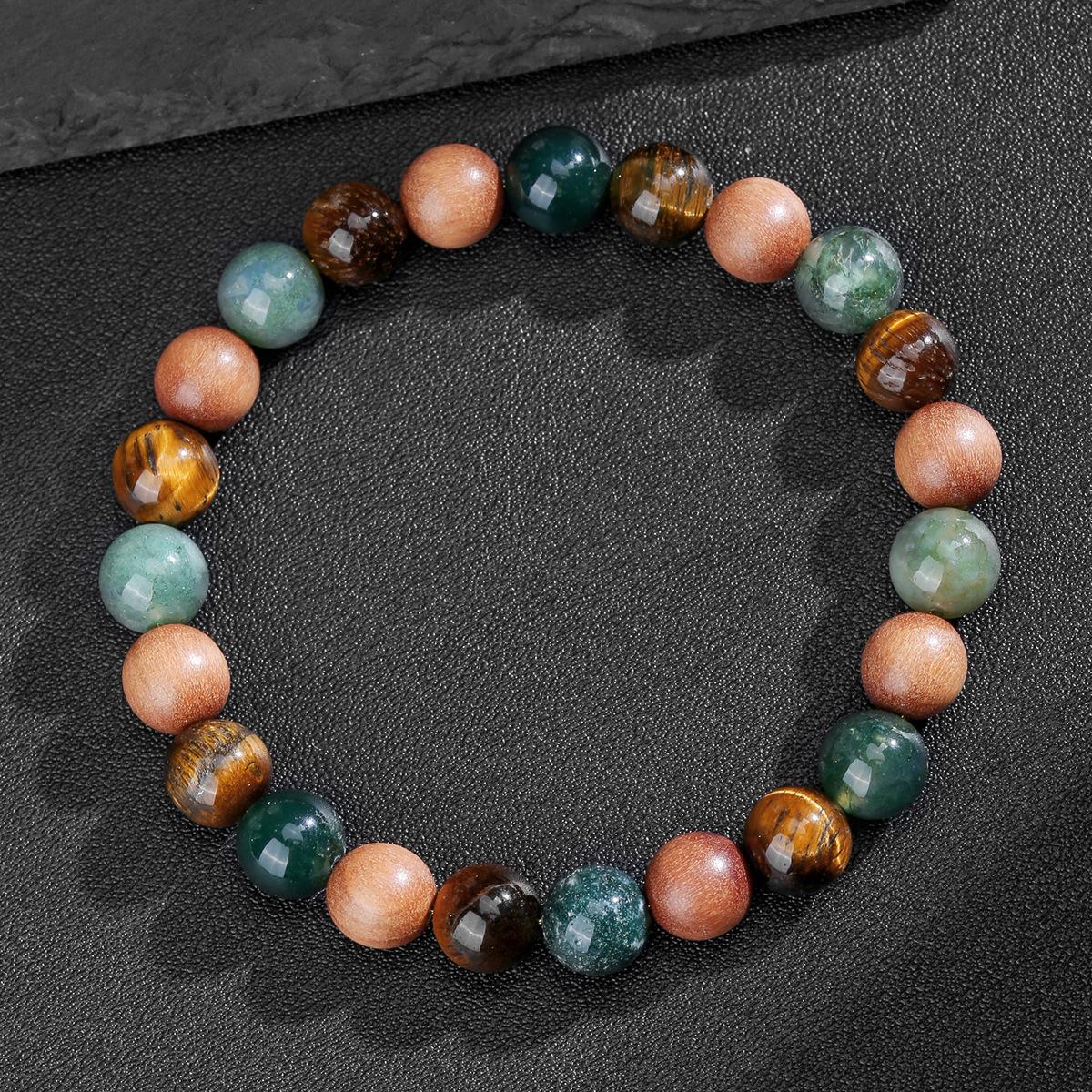 

Космическое плавание Браслет из натурального кристалла и сандалового дерева Водный агат