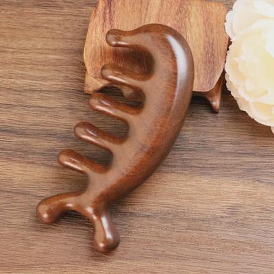 Peigne de massage méridien en bois de santal – Motif lion de mer en bois massif vert