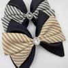 Korean-Style Black & White Striped Bow Claw Clip for Women - High-End Hairpin for Volume and Half Updos