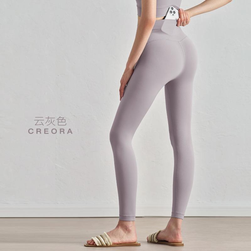 High waist naked nine-point yoga pants, pockets, belly and hips, Pilates fitness pants, and tight sports trousers outside.
