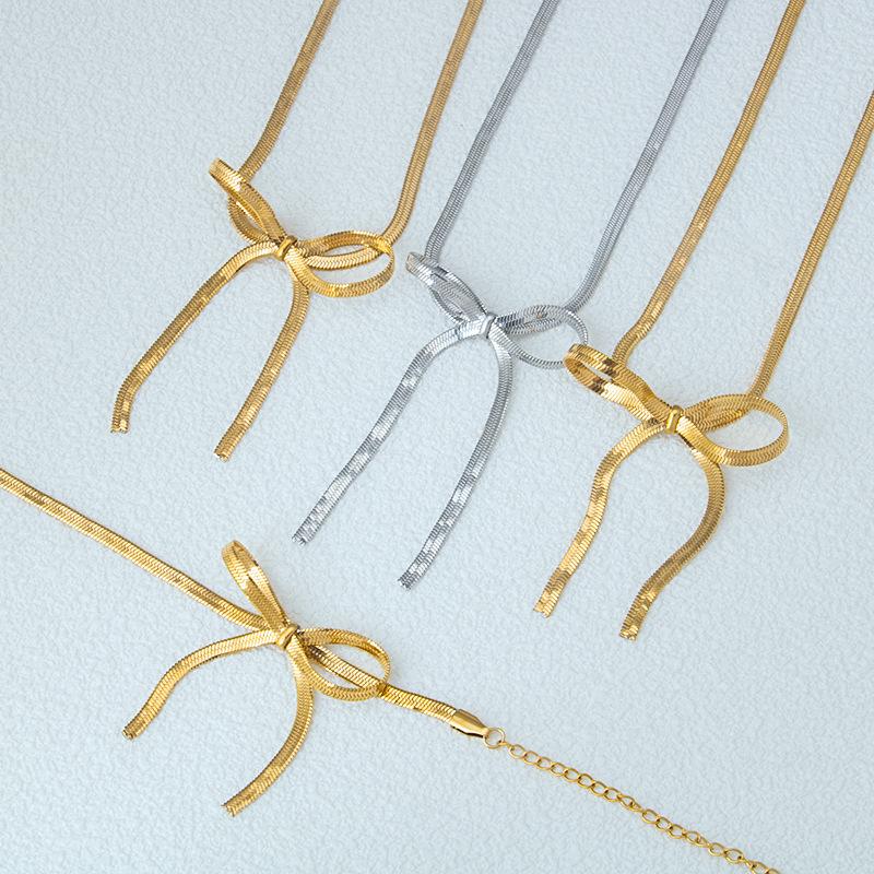 

High-End Minimalist Geometric Stainless Steel Bow Necklace & Women s Titanium Bracelet