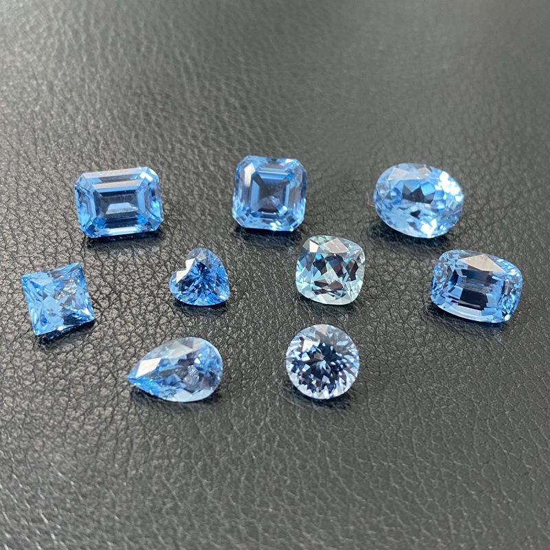 

Cultured Gemstone Aquamarine Spinel Ring with Side Stones Pear