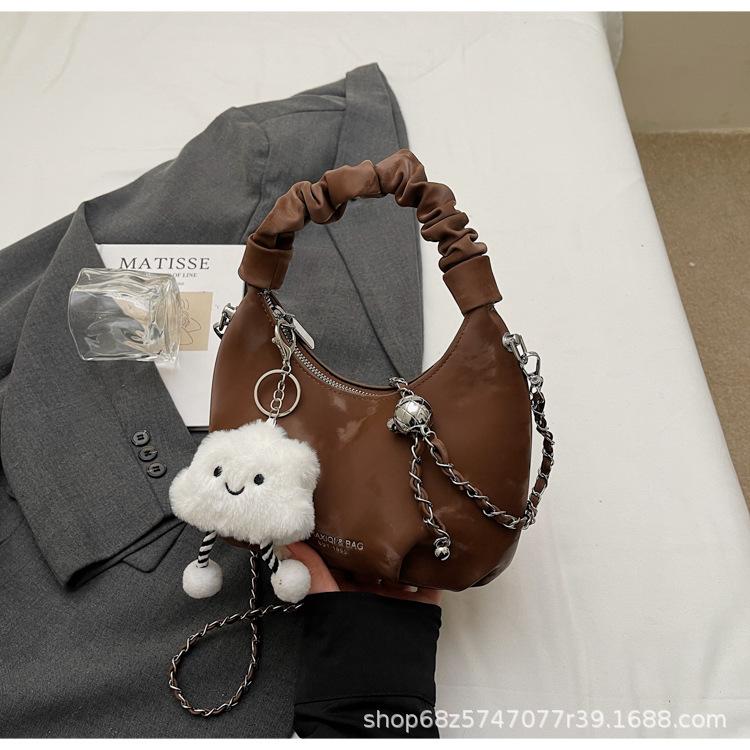 

Korean version of super fire niche cloud bag women s 2025 new versatile chain messenger bag exquisite pleated portable small bag темно-коричневого
