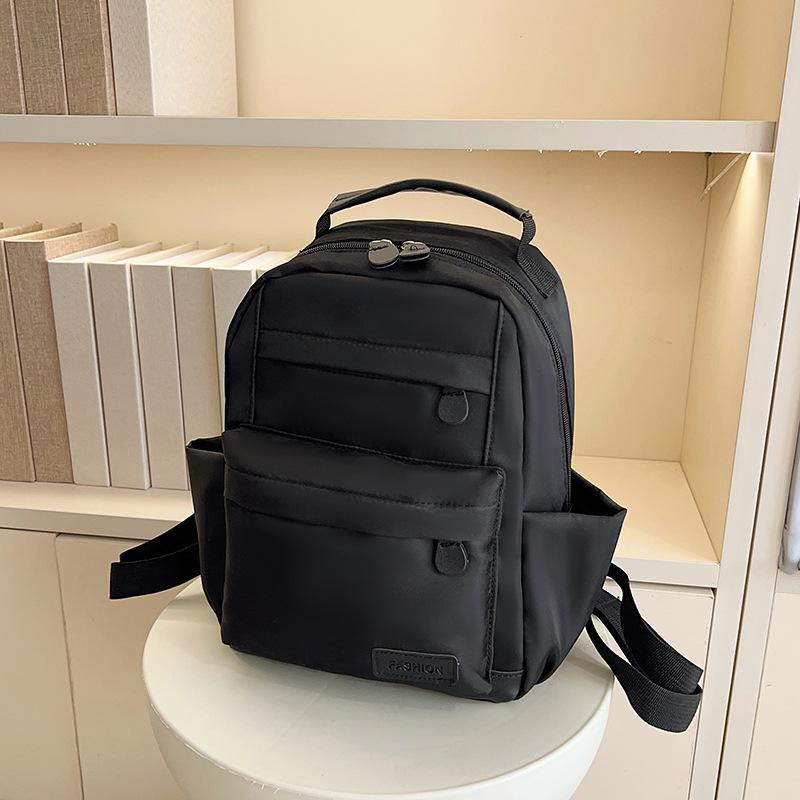 2025 new high-value ins style simple leisure travel lightweight backpack women's small schoolbag college student backpack
