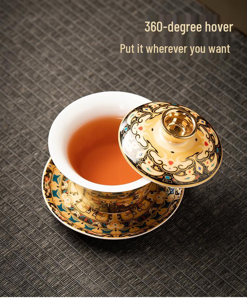 Rotating Sancai Gaiwan: Enamel Color Mutton Fat Jade Porcelain Tea Bowl with Lid for Kung Fu Tea Brewing.